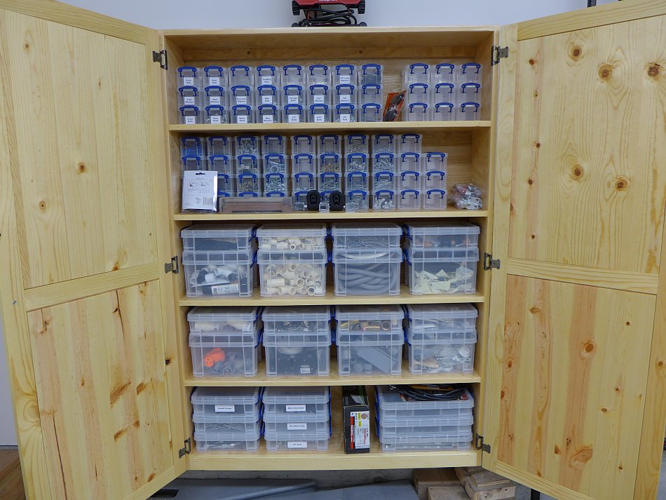 storage boxes in parts cabinet